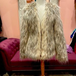 Gorgeous light weight faux fur short coat.